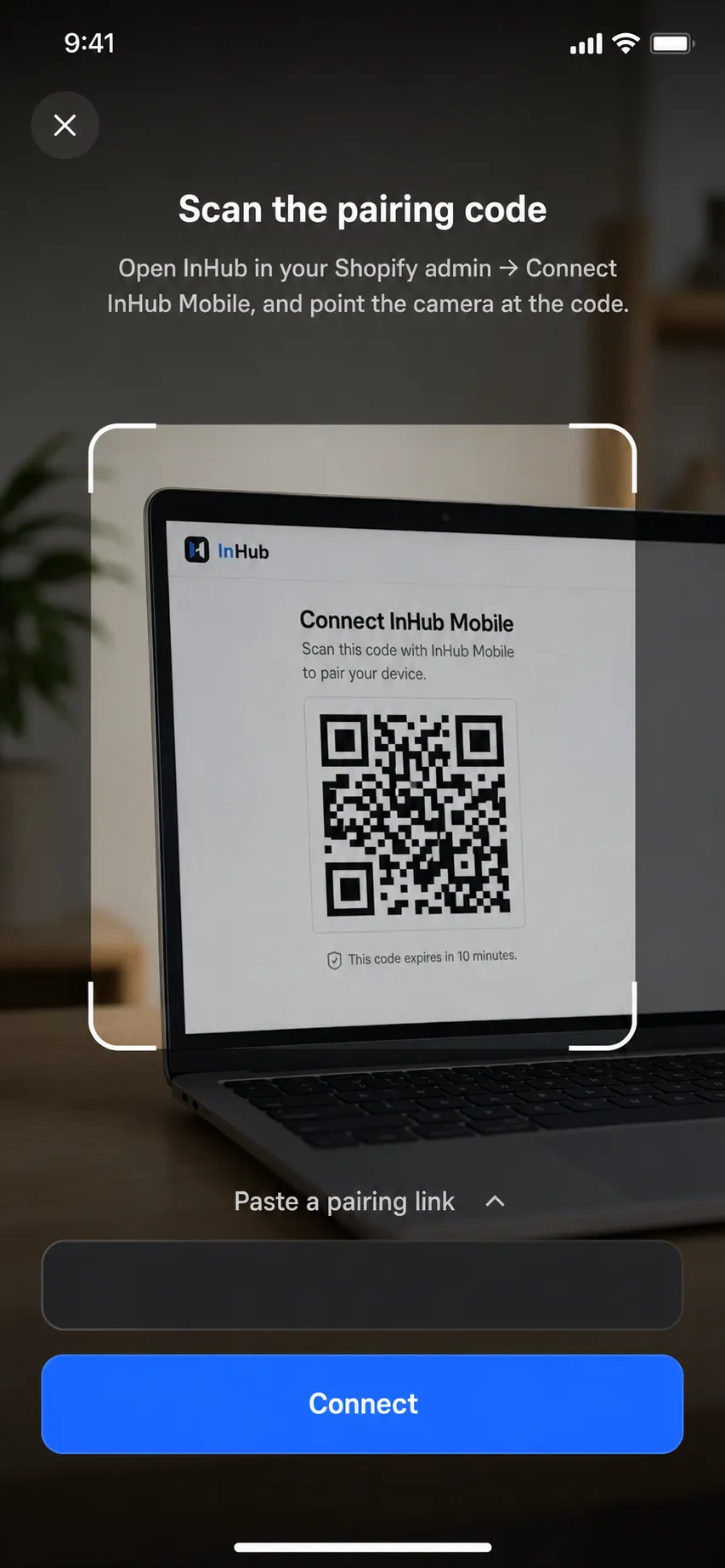 InHub mobile scanning the pairing QR code shown in the Shopify admin
