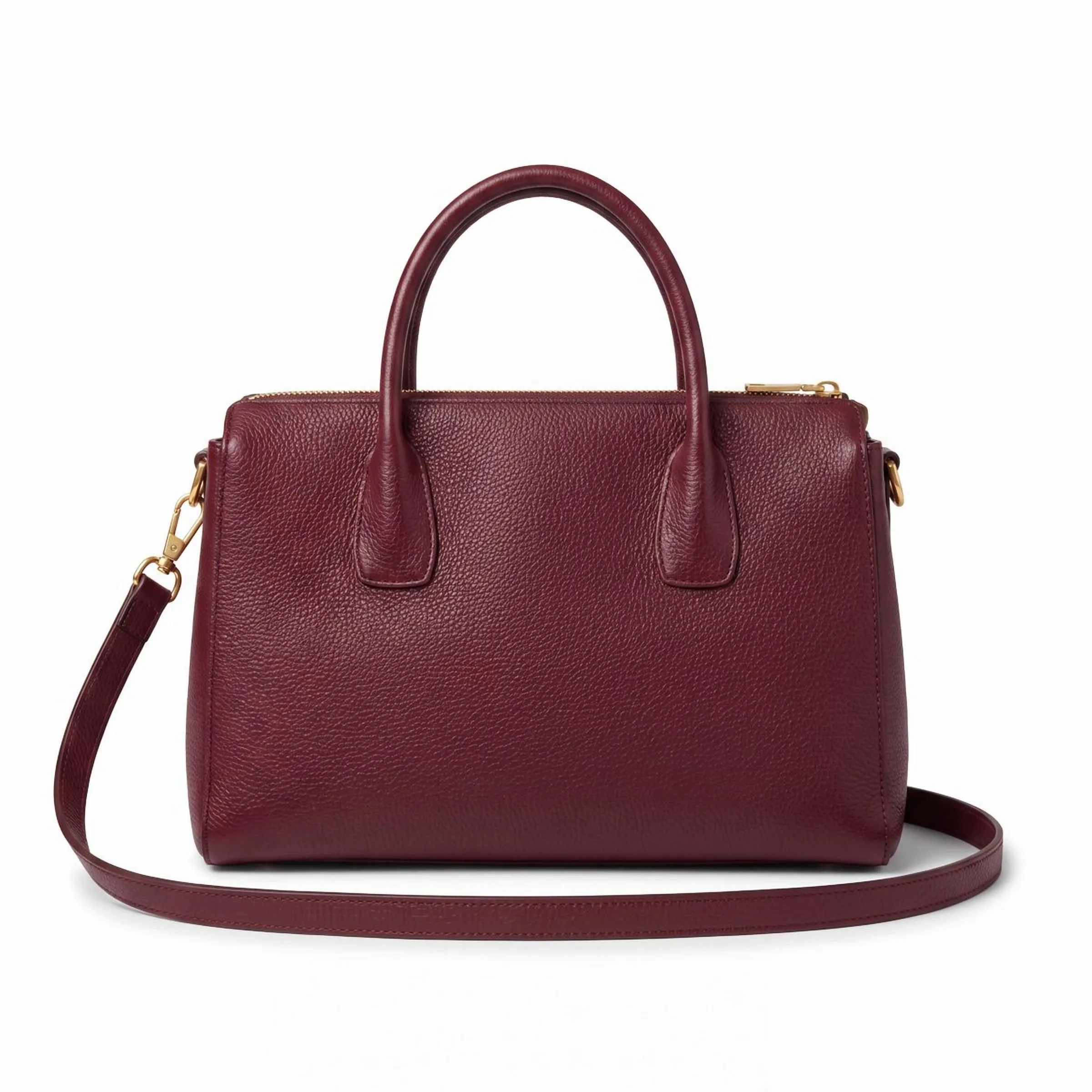 A burgundy leather tote, cut out on a plain white background