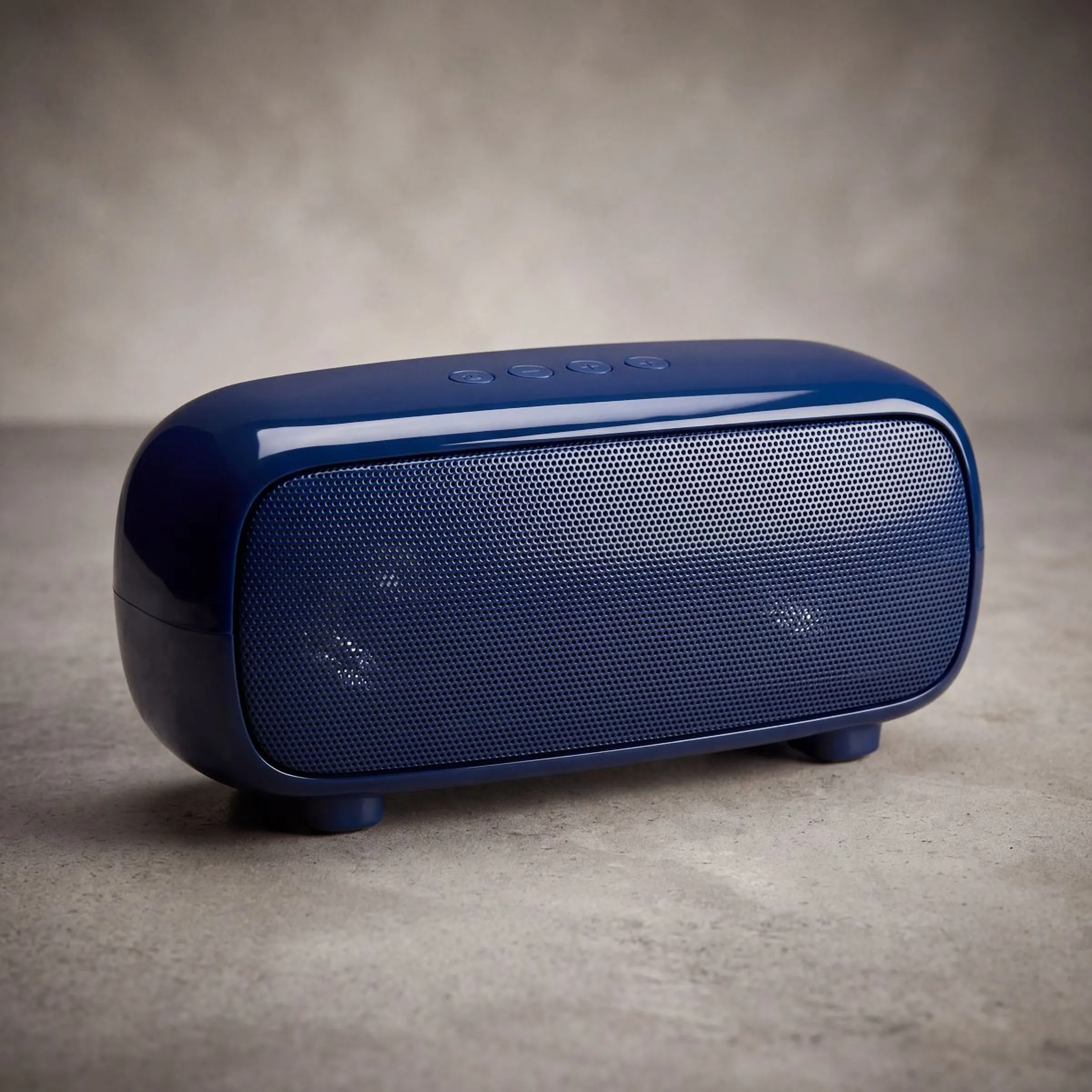 The same speaker lit against a plain studio backdrop